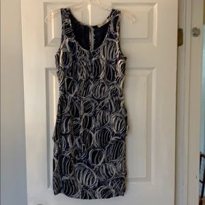 Navy sleeveless dress with circular fun pattern